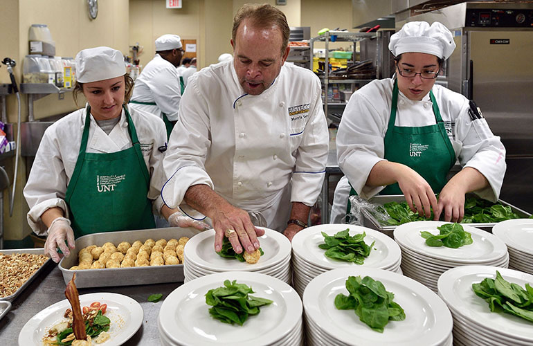 Chef Salerno teaching students.